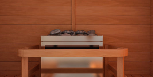 Scandia electric sauna heater with guard rail installed in a cedar sauna room