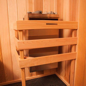 Scandia cedar guard rail installed around a corner-mounted electric sauna heater